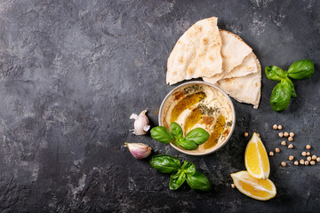 Hummus with olive oil and ground cumin