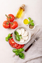 Mozzarella salad over white texture background