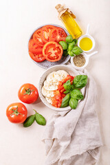 Mozzarella salad over white texture background
