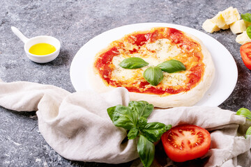 Homemade pizza margherita with mozzerala cheese
