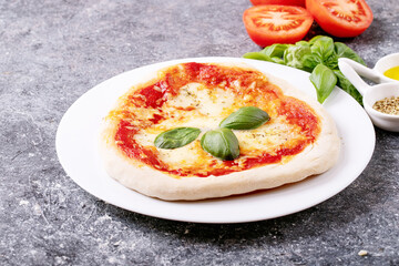 Homemade pizza margherita with mozzerala cheese