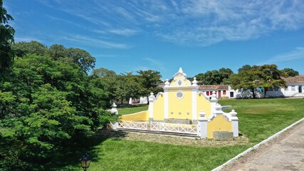 Panoramic view of a yellow fountain in colonial style in Cidade de Goias, former Goias Velho City,...