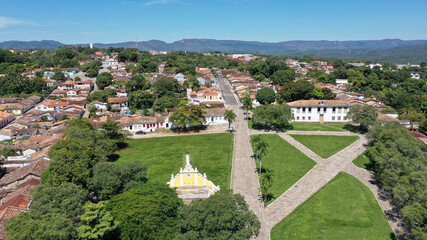 Fototapeta na wymiar Panoramic view of a yellow fountain in colonial style in Cidade de Goias, former Goias Velho City, in Goias State, Brazil 