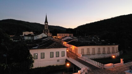 Colorful buildings and cobblestone streets in the historical center of Cidade de Goias in the heart...