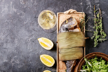 Raw uncooked fresh gutted sea bream or dorado fish