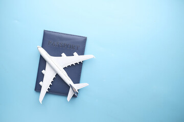 top view of passport and plate on table with copy space 