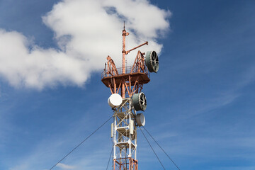 TV tower on a high hill near the village of Taskala, WKO, Kazakhstan. Satellite dishes and...