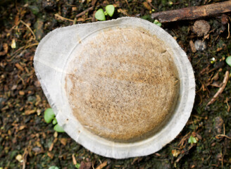 an old, used coffee pad