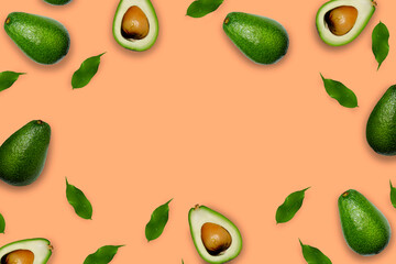 background banner with avacado with place for text in the center, orange background with avacado