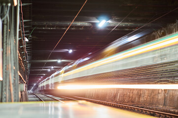 Light trails from the subway bending