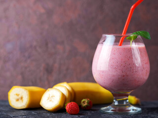 Smoothies with strawberries and banana in a glass