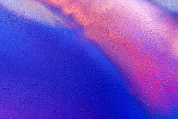 Beautiful bright colorful street art graffiti background. Abstract creative spray drawing fashion colors on the brick walls of the city. Urban Culture gradient texture, backdrop