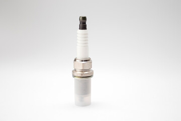 A new spark plugs on white background