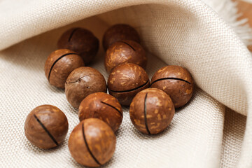 Healthy, organic inshell macadamia nuts. An expensive nut for the keto diet.
