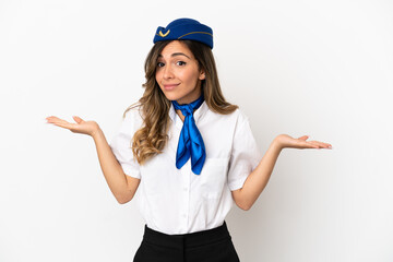 Airplane stewardess over isolated white background having doubts while raising hands