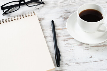 Still life of office workspace with cup of coffee