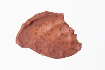 Skin scrub smear on isolated background. Cosmetic product. Cleansing and exfoliating your skin