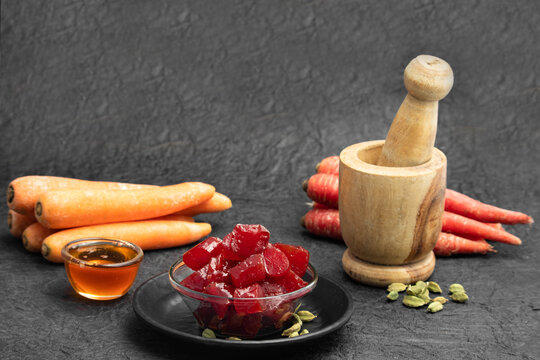 Ayurvedic Gajar Ka Murabba Or Gazar Murba Is Carrot Jam Made Of Carrots, Sugar Syrup And Bee Honey Shahad Madhu. It Can Be Preserved And Stored. Isolated On Black Background With Copy Space
