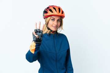 Young blonde Uruguayan cyclist woman isolated on background happy and counting three with fingers