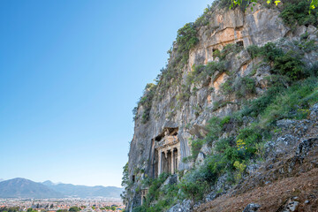Fototapeta na wymiar The scenic view of The Tomb of Amyntas, also known as the Fethiye Tomb, is an ancient Greek rock-hewn tomb at ancient Telmessos, in Lycia, currently in the district of Fethiye in Muğla.