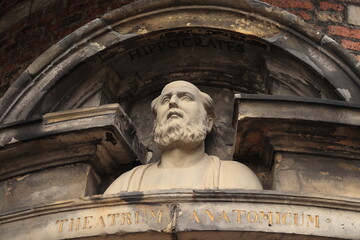 Amsterdam De Waag Building Close Up with the Bust of Hippocrates, Nieuwmarkt, Red Light District