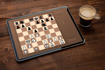 Digital tablet with chess app on screen
