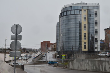 A building with glasses (side with signs)