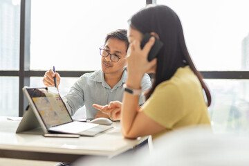 Business teamwork work on financial report on laptop computer.