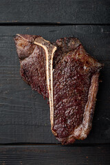 Prepared grilled large t bone steak , top view flat lay