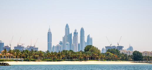 Fototapeta premium Dubai Marina skyscrapers and villas on the Palm Jumeirah. Luxury properties of UAE