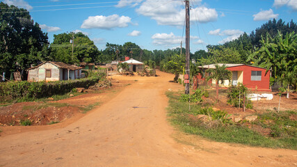 Obraz premium Cuban dirt road in a rural area of the Camaguey province. 
