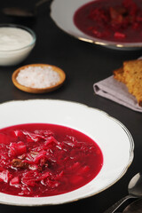 A plate with Ukrainian national dish - borsch
