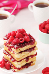 Sandwiches with peanut butter and raspberry jam