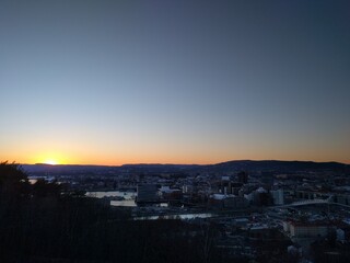 sunset over the city in the spring