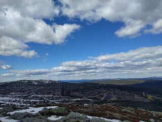 clouds over the mountains with blue sky