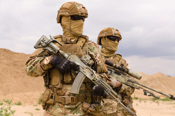 Two special forces soldiers close-up, military anti-terrorism operations concept