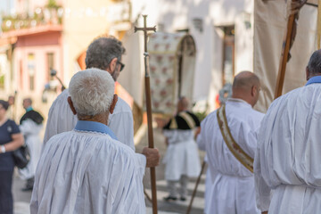 Fototapeta na wymiar Catholic procession with white clothes