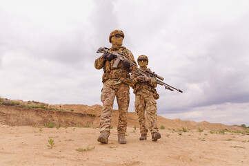 Two special forces rangers during the military operation in the desert
