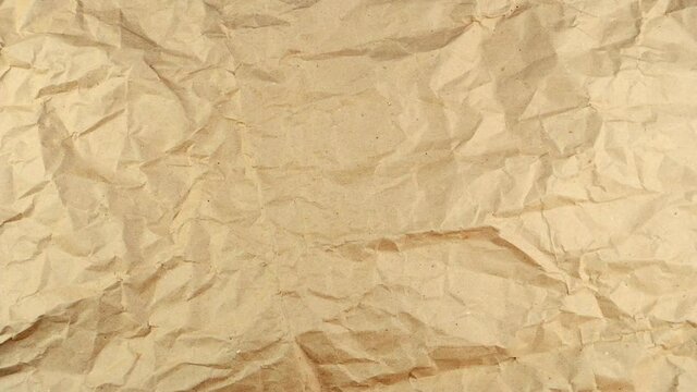 Stop motion of brown crumpled paper texture background