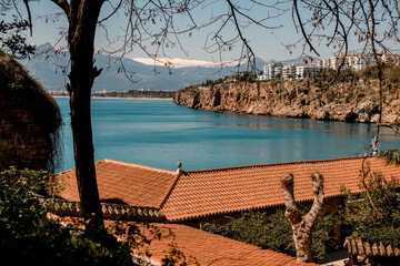 Amazing cityscape view of beautiful town and sea bay and mountains in background