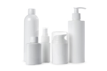 empty white plastic bottles for cosmetics on white background. Isolated and mockup