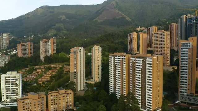 Aerial Truck Right Reveals Brick Apartment Buildings in South American City