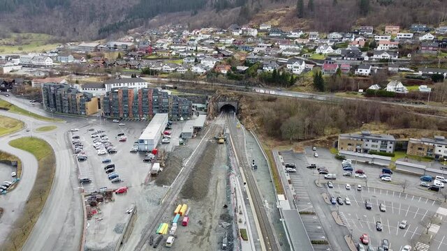 Building double tracks and tunnel at Bergensbanen railroad between Arna and Bergen - aerial over construction site