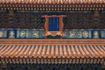 The ancient buildings with red wall, yellow or gray tile roof, door gate in the Forbidden City,...