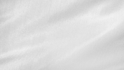 white silk fabric texture background with soft crumpled. cloth with soft waves texture background. abstract smooth elegant white flowing satin cloth with waves.