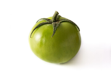 Fresh green tomato isolated on white background