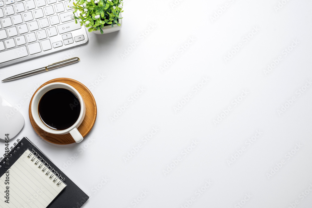 Poster white flat floor with mouse notebook coffee desk top view. copy space.