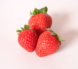 Fresh strawberries on white background.