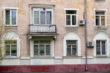 A fragment of a four story building built in the twentieth century in the USSR