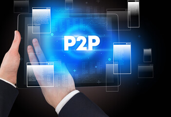 Close-up of a hand holding tablet